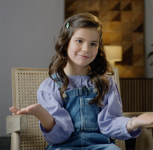 Smiling girl with hands forward and faced up